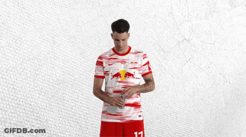 Man In Red And White Shirt With Red Bull GIF