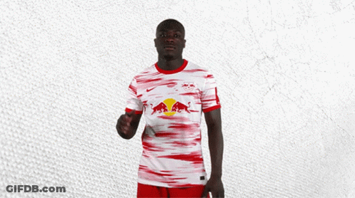 Man In Red And White Shirt With Red Bull GIF