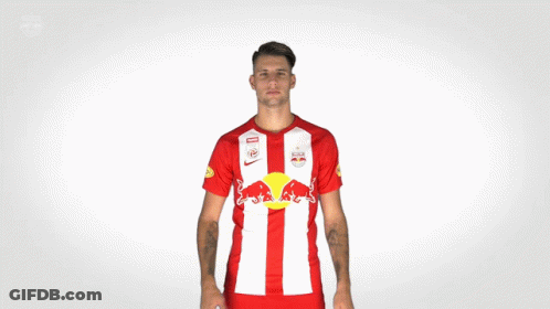 Man In Red And White Shirt With Red Bull GIF