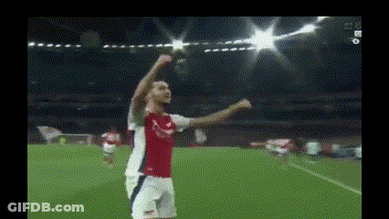 Man In Red-And-White Soccer Uniform Arms Up GIF