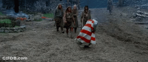 Man In Red And White Striped Dress Dancing With Others GIF