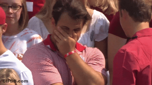 Man In Red And White Striped Shirt Covering Face GIF