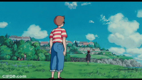 Man In Red And White Striped Shirt In Field GIF