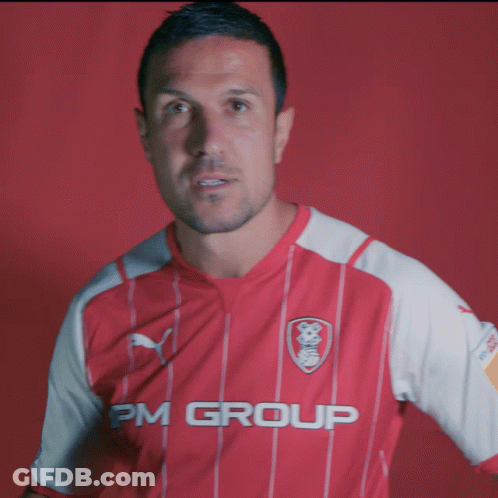 Man In Red And White Striped Shirt Saying IPM Group GIF