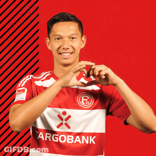 Man In Red And White Striped Shirt With Argobank GIF