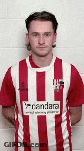 Man In Red And White Striped Shirt With Dandara Logo GIF
