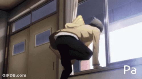 Man In Red And White Suit Hanging From Building At Night GIF