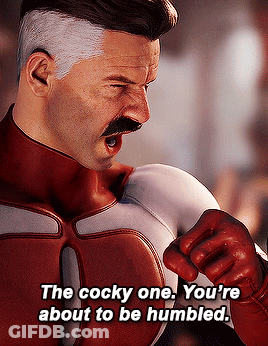Man In Red And White Superhero Costume Saying The Cocky One You're About To Be Humbled GIF
