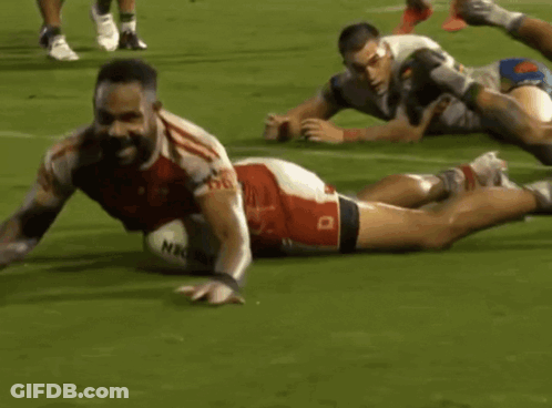 Man In Red And White TMCS Jersey Kicking Soccer Ball GIF