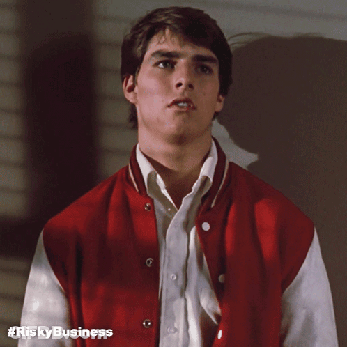 Man In Red And White Varsity Jacket Risky Business GIF