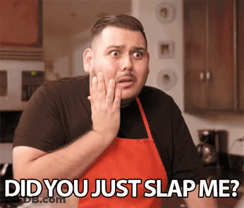 Man In Red Apron Surprised Did You Just Slap Me GIF