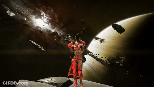 Man In Red Armor Standing In Front Of Planet GIF