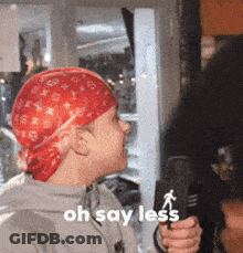 Man In Red Bandana Holding Mic Saying Oh Say Less GIF