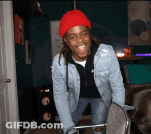 Man In Red Beanie And Denim Jacket Smiling GIF