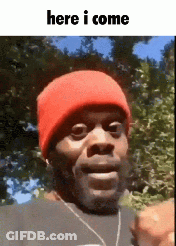 Man In Red Beanie Says Here I Come GIF