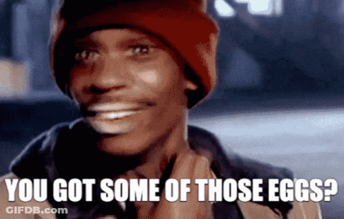 Man In Red Beanie Smiling Asking If He Has Eggs GIF