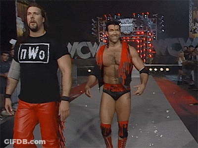 Man In Red Black Flaming Vest On Phone GIF