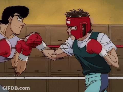 Man In Red Boxing Gloves Shaking Hands GIF