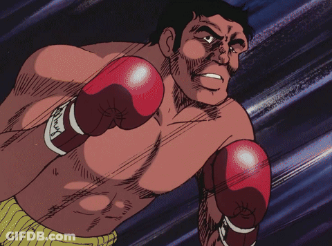 Man In Red Boxing Gloves With Max On Wrist GIF