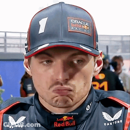 Man In Red Bull Hat Making Face GIF