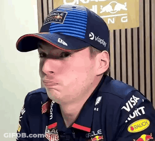 Man In Red Bull Hat Making Funny Face GIF