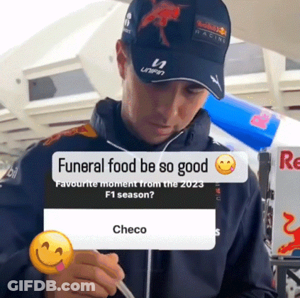 Man In Red Bull Hat Writing On Smiley Face Paper GIF
