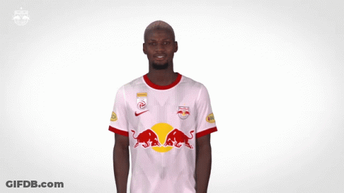 Man In Red Bull Jersey Dancing GIF