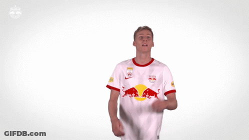 Man In Red Bull Jersey Looking At Ball GIF