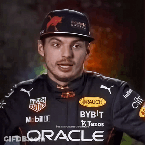 Man In Red Bull Racing Uniform And Hat GIF
