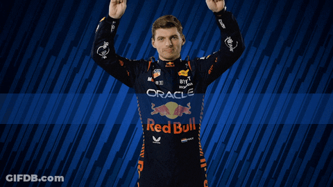 Man In Red Bull Racing Uniform Hands On Hips GIF