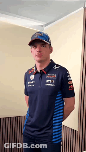 Man In Red Bull Shirt And Hat GIF