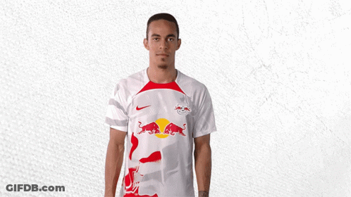 Man In Red Bull Shirt Holding Basketball GIF