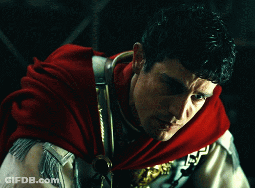 Man In Red Cape And Gold Armor GIF