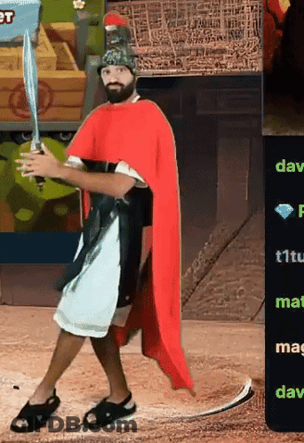 Man In Red Cape And Helmet Holding Sword GIF