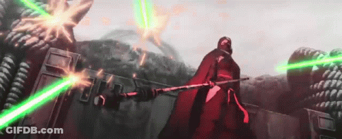 Man In Red Cape Holding Green Lightsaber GIF