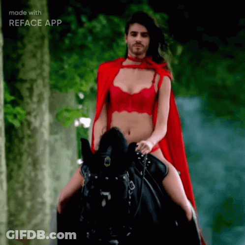 Man In Red Cape Riding Black Horse GIF