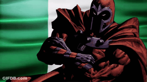 Man In Red Cape Standing In Front Of Green Background GIF