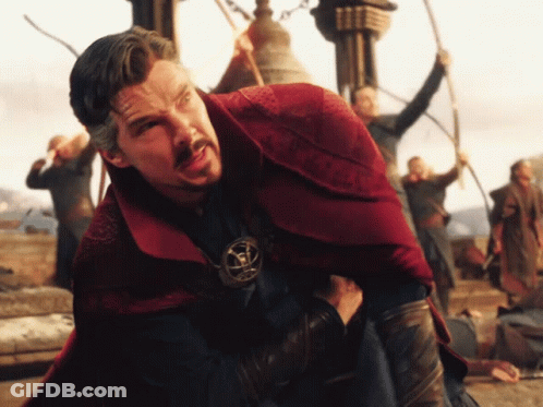 Man In Red Cape With Doctor Strange Pendant GIF