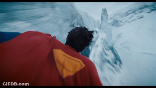 Man In Red Cape With Yellow Triangle GIF