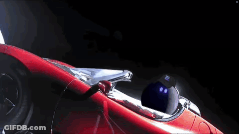 Man In Red Car Flying In Space GIF