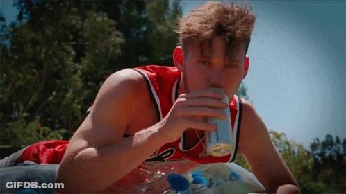 Man In Red Chicago Bulls Jersey Drinking Soda GIF