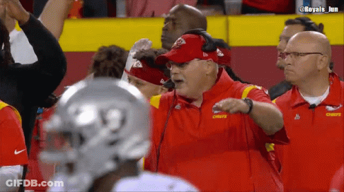 Man In Red Chiefs Jacket Talking Into Microphone GIF