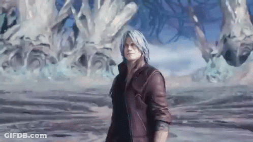 Man In Red Coat And Black Pants Standing On Concrete GIF