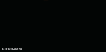 Man In Red Coat At Red Verizon Sign GIF