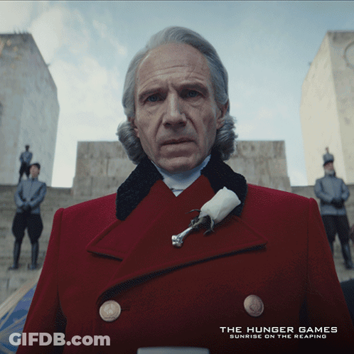 Man In Red Coat Hunger Games Sunrise On The Reaping GIF