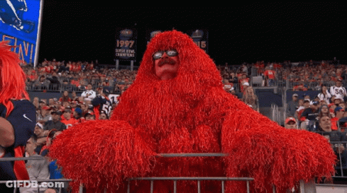 Man In Red Costume At Super Bowl GIF