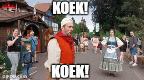 Man In Red Costume Saying Koek Koek GIF