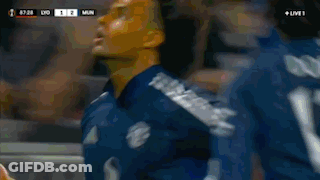 Man In Red Emirates Fly Better Jersey GIF