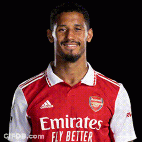 Man In Red Emirates Fly Better Shirt GIF