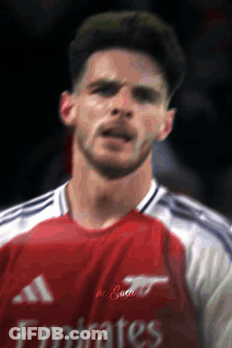 Man In Red Emirates Jersey Close Up GIF